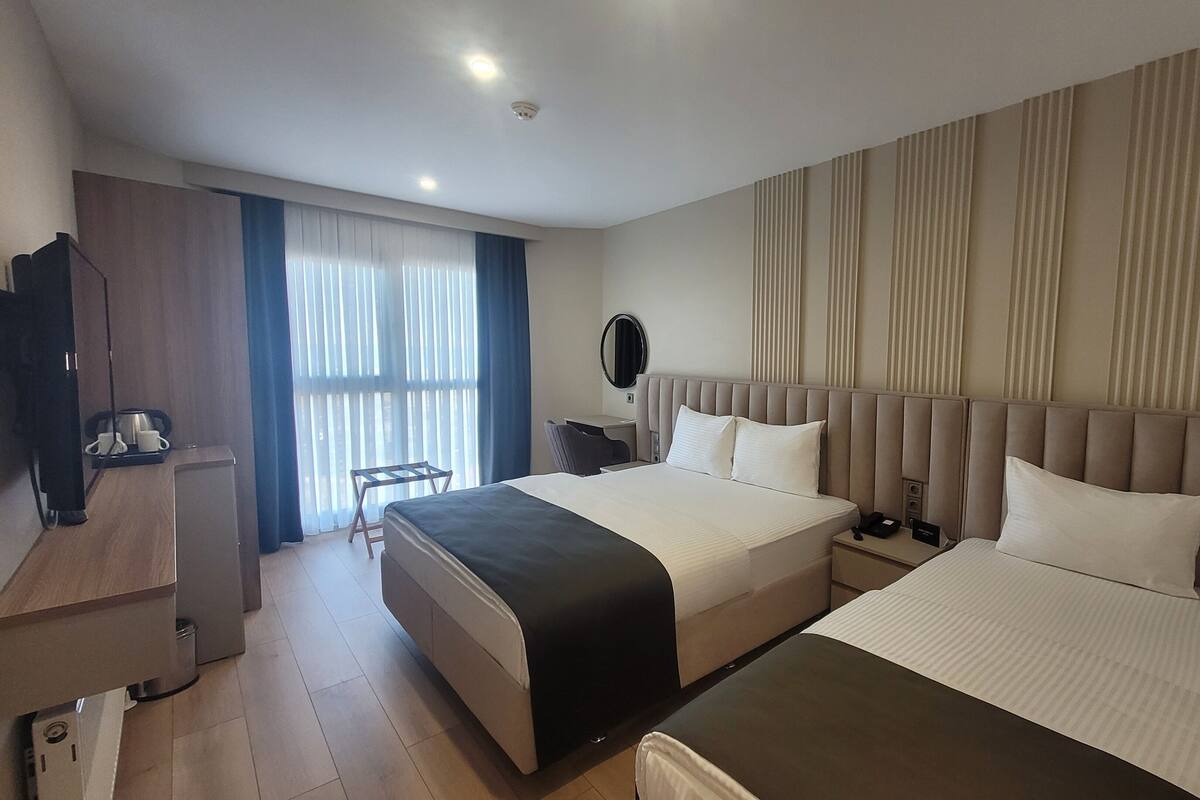 Family Twin Room, Sea View | In-room safe, blackout drapes, iron/ironing board (on request)