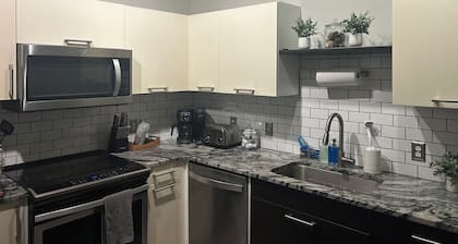 Spacious 3-bedroom condo near campus with AC and includes two parking spots