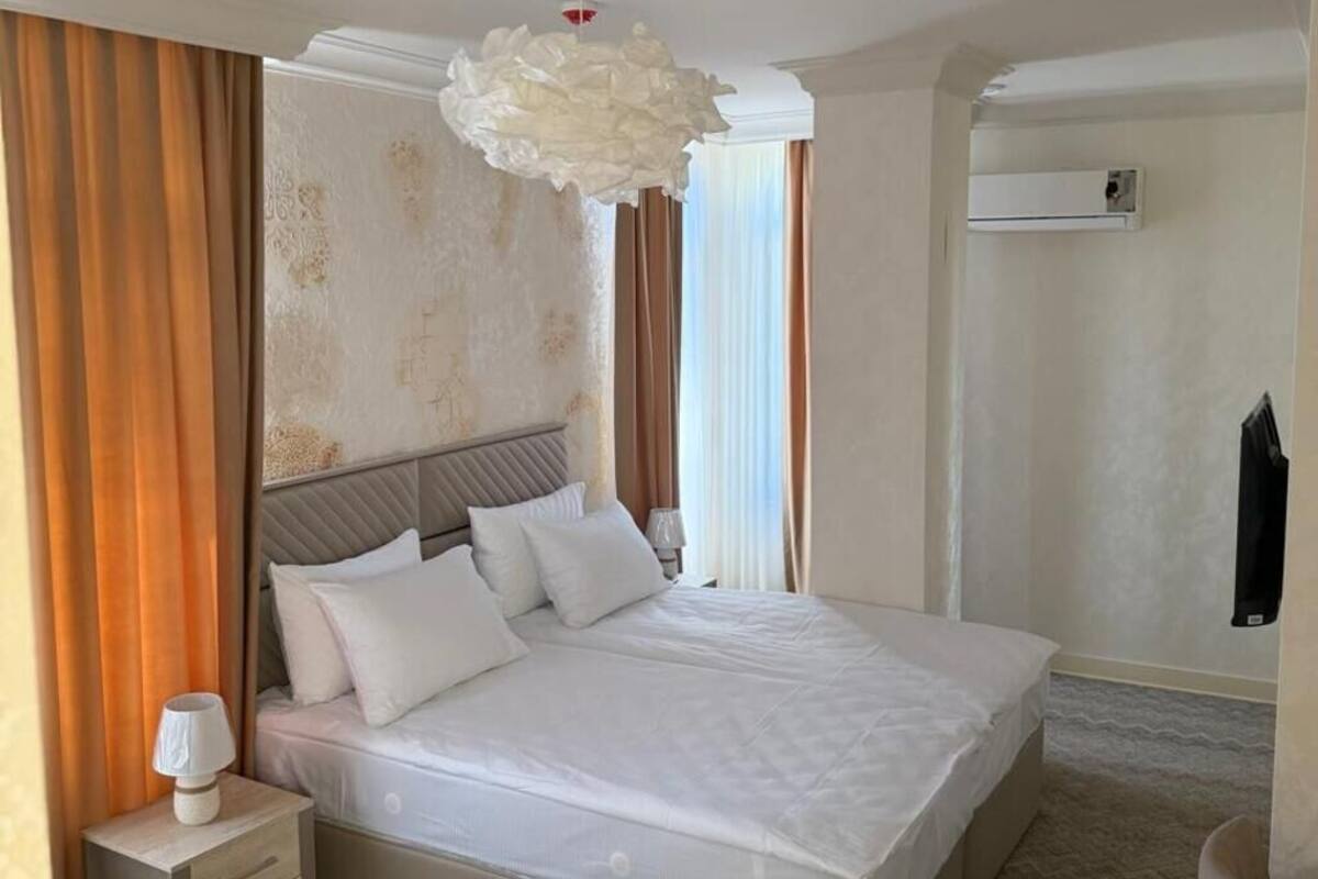 Standard Double or Twin Room, City View | In-room safe, desk, laptop workspace, blackout drapes