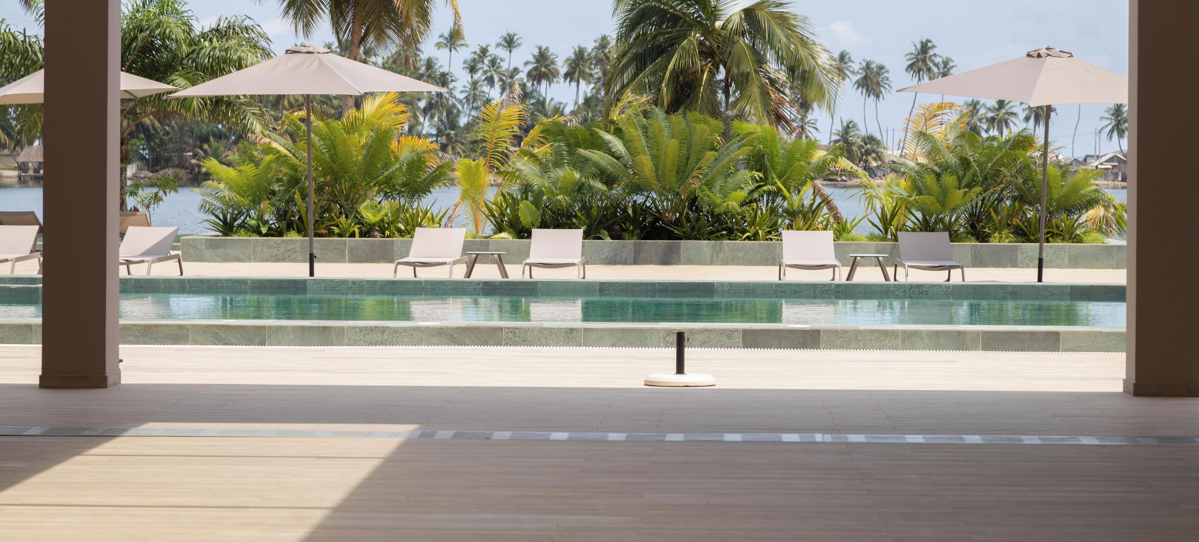 2 outdoor pools, open 8:00 AM to 10:00 PM, pool umbrellas, sun loungers