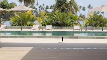 2 outdoor pools, open 8:00 AM to 10:00 PM, pool umbrellas, sun loungers