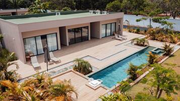 Superior Villa | Pool | 2 outdoor pools, open 8:00 AM to 10:00 PM, pool umbrellas, sun loungers