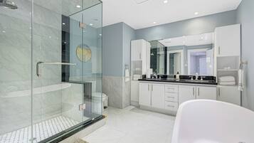 Shower, hair dryer, towels, soap