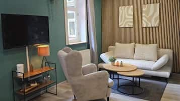 Chambre Double Confort, vue montagne | Coin séjour