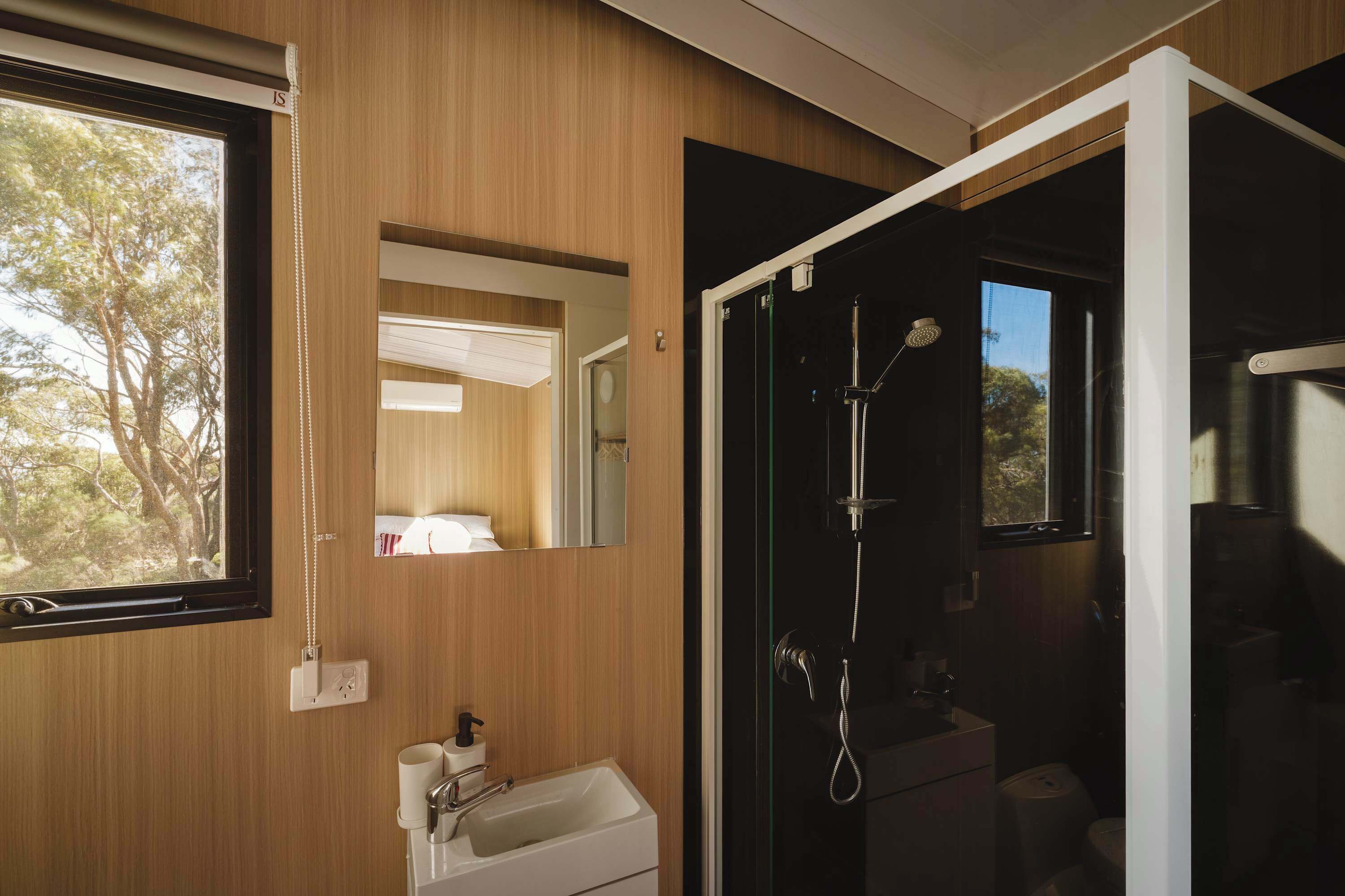 Shower, hair dryer, towels, shampoo