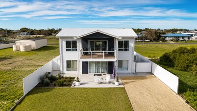 Modern Coastal Retreat | Walk to the Beach | Sleeps 12