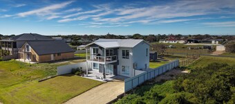 Modern Coastal Retreat | Walk to the Beach | Sleeps 12