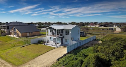 Modern Coastal Retreat | Walk to the Beach | Sleeps 12
