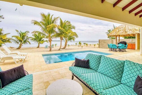 Oceanfront oasis on the beach with private pool, gazebo, grill, patio, and AC