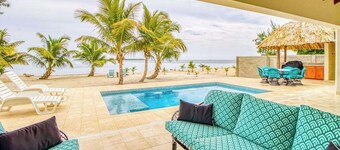 Oceanfront oasis on the beach with private pool, gazebo, grill, patio, and AC