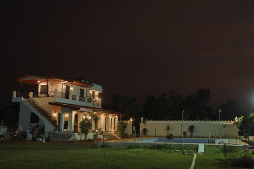 Cozy 2-bedroom with luxurious Pool and kitchen farmhouse in Chittorgarh with AC