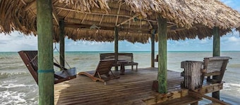 Tropical beachfront getaway with private pool, ocean views & enclosed yard
