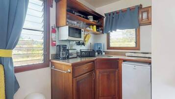 Microwave, stovetop, coffee/tea maker, electric kettle