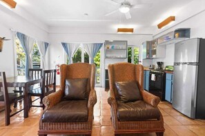 TV - Oceanfront escape with shared, outdoor pool, free WiFi, & air conditioning (Placencia)