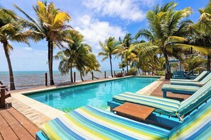 Pool - Oceanfront escape with shared, outdoor pool, free WiFi, & air conditioning (Placencia)