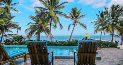 Colorful oceanfront condo with shared pool and jetted tub