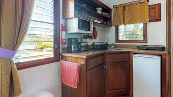 Microwave, stovetop, coffee/tea maker, electric kettle
