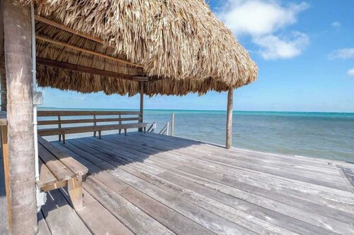 Beachfront abode with well-equipped kitchen - pool, beach, grill, & canoe access