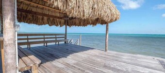 Beachfront abode with well-equipped kitchen - pool, beach, grill, & canoe access