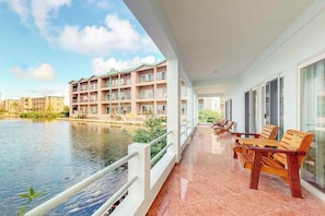 Property grounds - Beautiful lake-view villa with balcony, pool, & partial AC - near dining & shops (San Pedro)