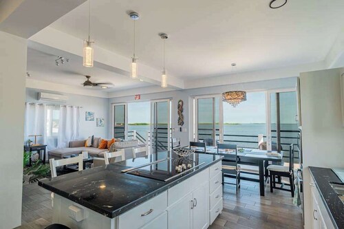 Amazing 2 story oceanfront house with pool, balcony, central AC, & WD