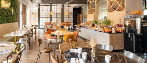 A modern cafe with multiple seating areas, a bar, and a coffee machine.