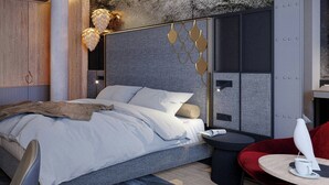 A modern bedroom with a bed, a red chair, a small table with a cup, and a textured wall. - The Brick, a Tribute Portfolio Hotel - Adults Only (Gdansk)