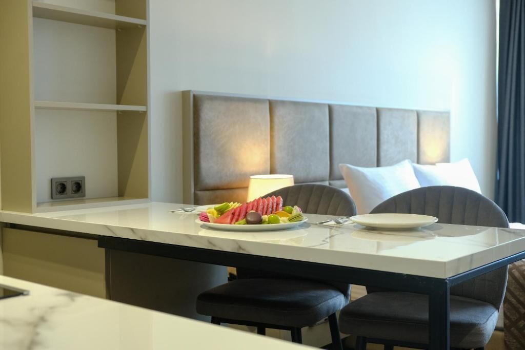 Habitación Deluxe doble, balcón, vistas a la ciudad | Restauración