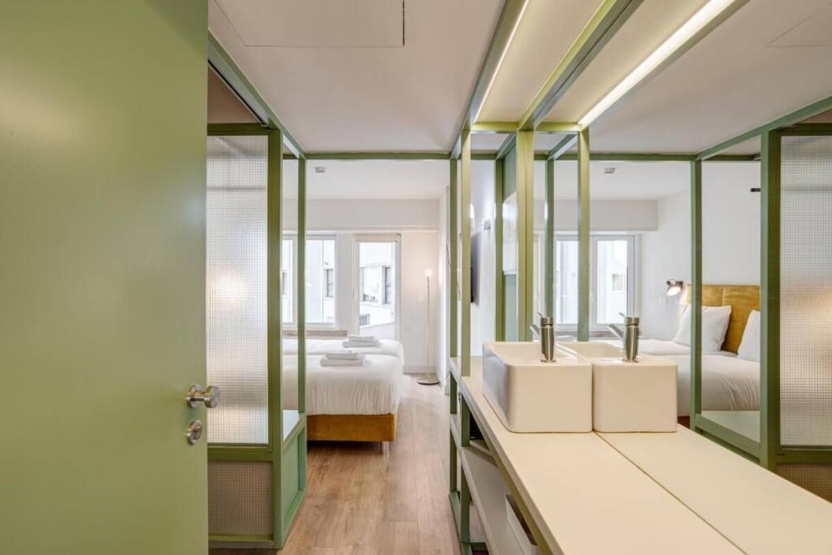 Suite, Balcony, Courtyard View | In-room safe, iron/ironing board, WiFi (free)