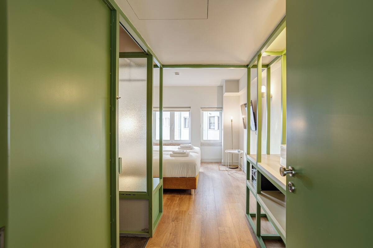 Suite, 2 Twin Beds | In-room safe, iron/ironing board, WiFi (free)