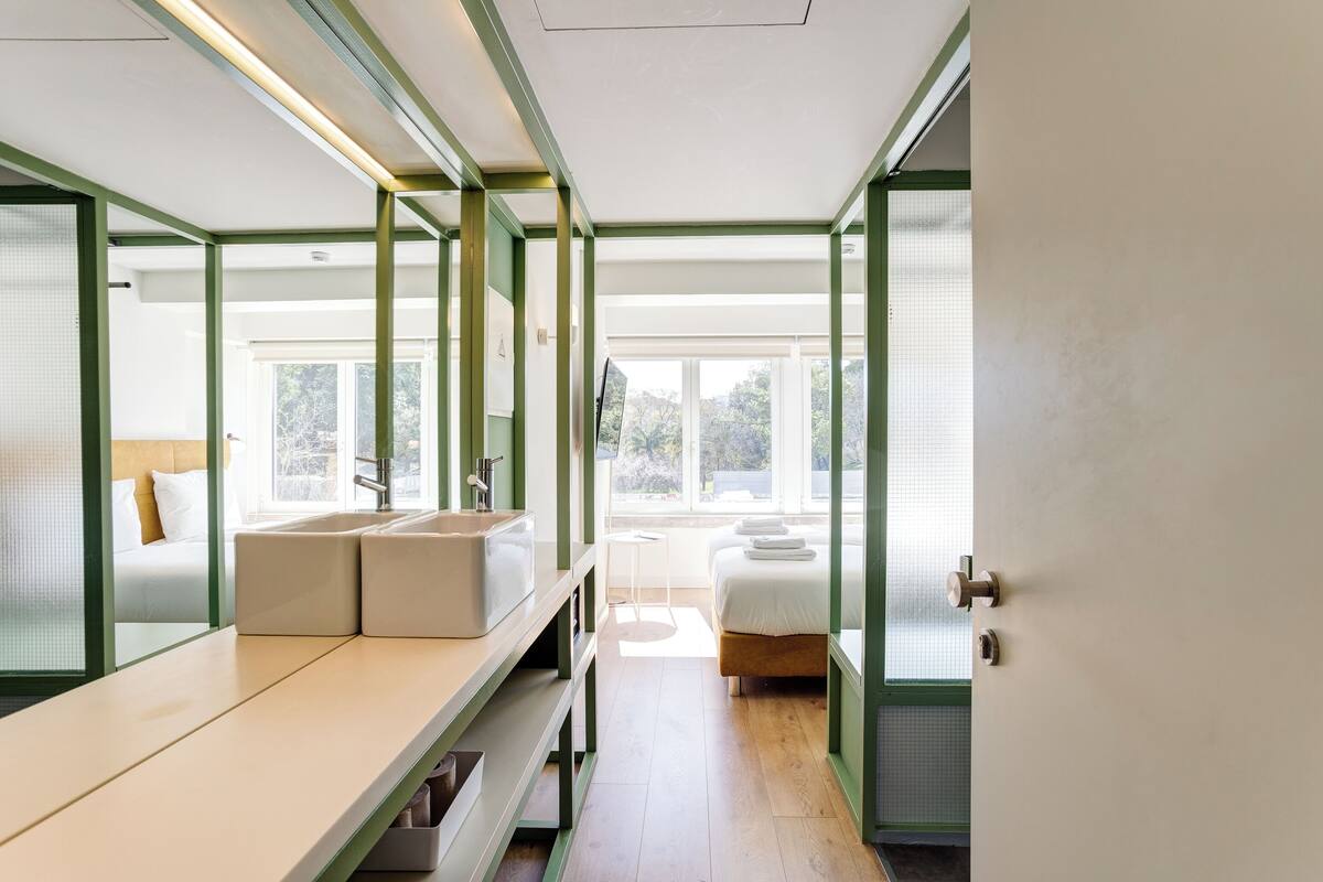 Suite, 2 Twin Beds | In-room safe, iron/ironing board, WiFi (free)