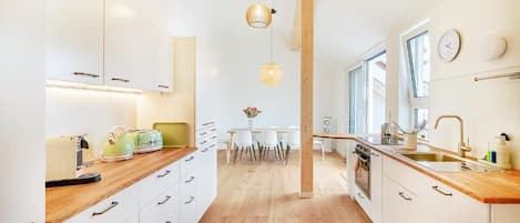 Superior Apartment, Courtyard View | Private kitchen | Fridge, oven, stovetop, dishwasher