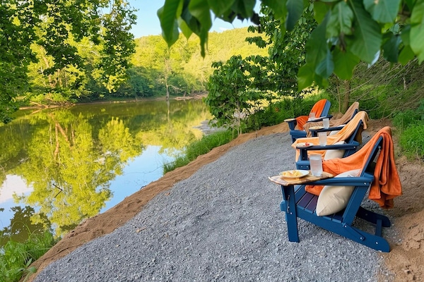 Come rest awhile by the River