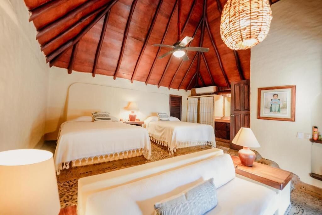 Deluxe Twin kamer, uitzicht op tuin | Verduisterende gordijnen, een strijkplank/strijkijzer, gratis wifi