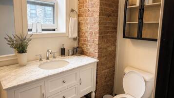 Hair dryer, towels, soap, toilet paper