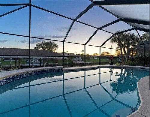 Palm Coast Waterfront Escape Pool & BBQ