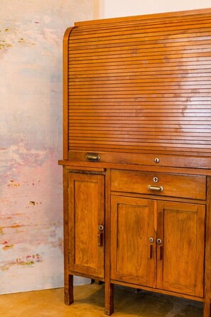 A wooden cabinet with drawers and a lockable top compartment. - Rosarinho Cruz invites to her Atelier by the River (Porto)