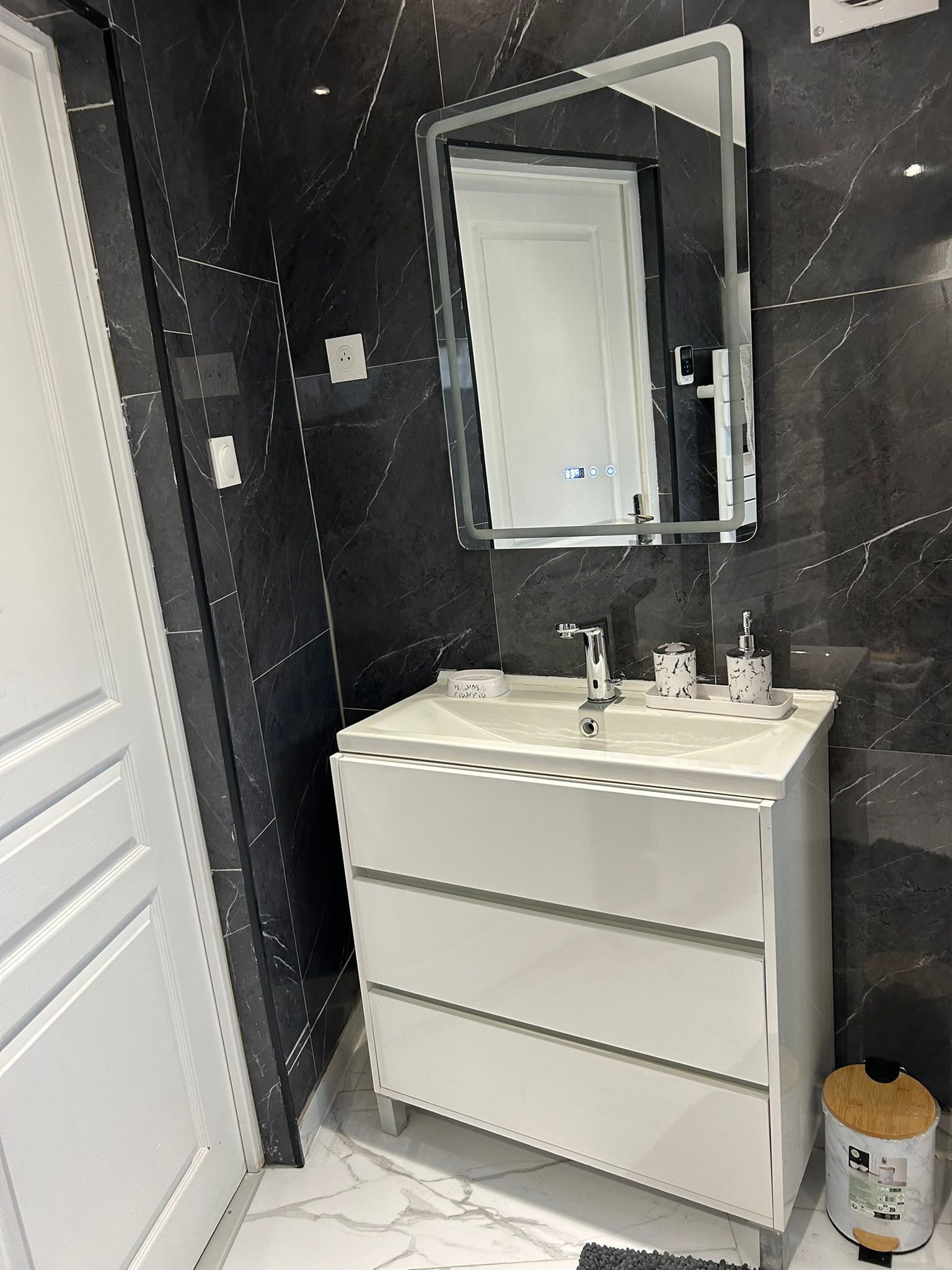 Shower, hair dryer, towels, toilet paper