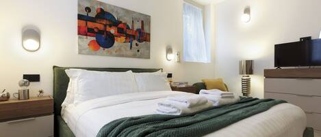1 chambre, fer et planche à repasser, Wi-Fi gratuit, draps fournis