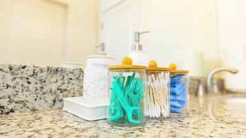 Hair dryer, towels, soap, toilet paper