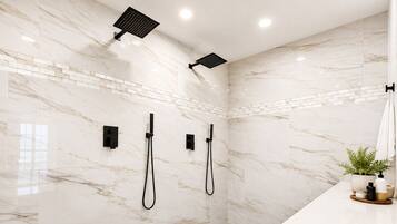 Shower, towels, soap, toilet paper