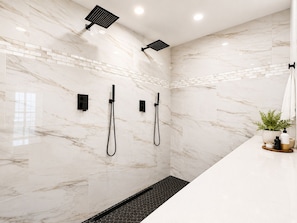 Shower, towels, soap, toilet paper