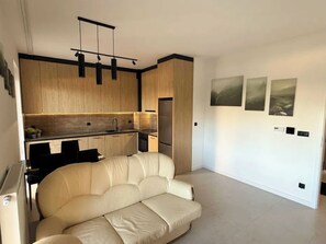 Deluxe Apartment, Patio, City View | Living area - Golden Stay (Wrocław)