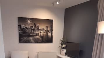 Comfort Apartment, Patio, City View | In-room safe, desk, laptop workspace, iron/ironing board