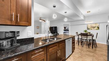 Coffee/tea maker, fridge, microwave, oven