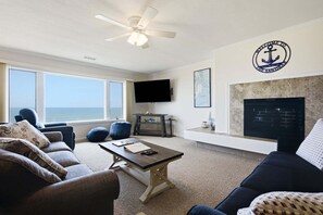 TV, fireplace, books - 5731 - The Sandbar Wake to ocean views! 3BR condo with pool, elevator & beach access. (Nags Head)