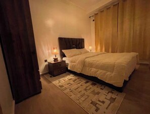 Comfort Apartment, Pool View | Blackout drapes, WiFi (free), bed sheets - Rental apartment (Marrakech)