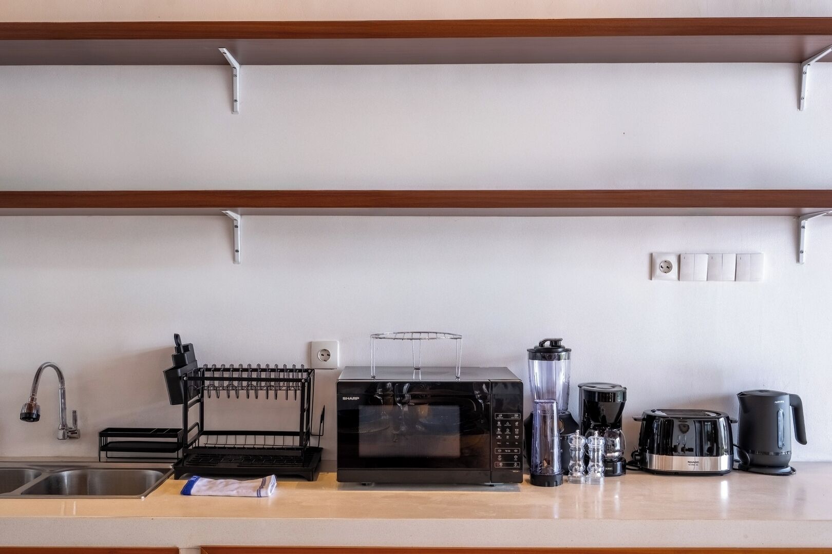 Fridge, stovetop, coffee/tea maker, cookware/dishes/utensils