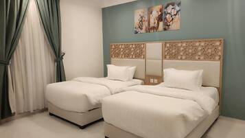 Suite familiar | Ropa de cama hipoalergénica y camas con pillow-top