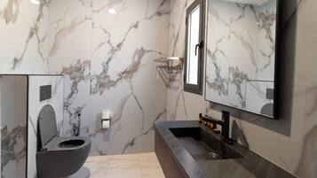 Studio, Garden View | Bathroom | Shower, towels, soap, shampoo